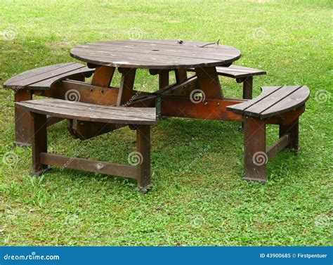 Garden Table With Benches In Middle Of Grass Stock Image Image Of