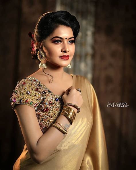 Indian Tv Actress Rachitha Mahalakshmi Golden Satin Saree Photos And