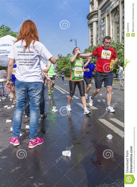 Runners Take A Water In A Marathon Race Editorial Stock Photo Image