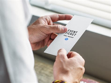 Download Event Ticket in Hand Mockup - Mockup Love