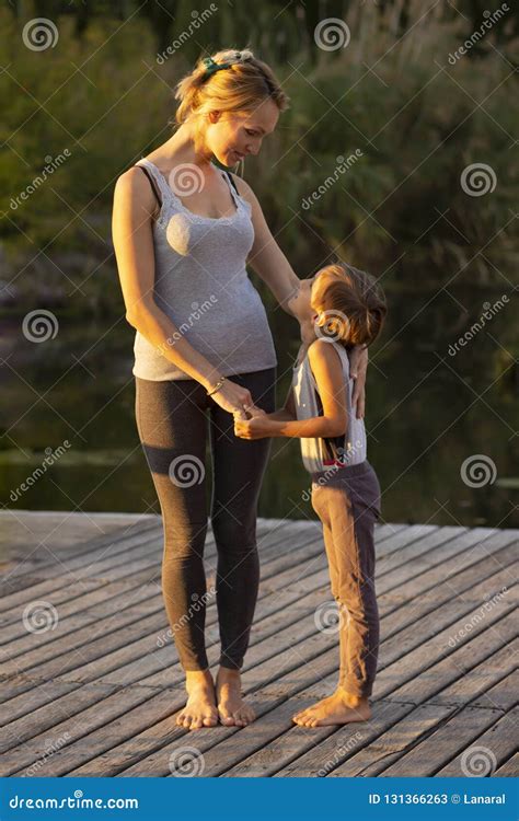 Mother And Son Exercising Yoga Pose Stock Image Image Of Lifestyle Park