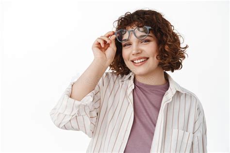 Close Up Portrait Of Attractive Smiling Woman Take Off Glasses Eyewear Holding Over Forehead