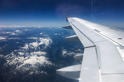 Free Stock Photo Of Airplane Wing Over Mountains