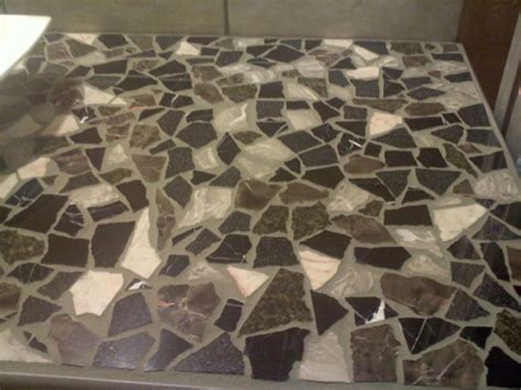 Granite & quartz remnants granite and quartz countertop remnants looking for a smaller piece of stone for your bathroom vanity or countertop? Free Mosiac Vanity | Shower floor tile, Recycled granite ...