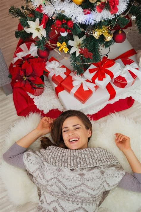 Happy Woman Laying Near Christmas Tree Upper View Stock Image Image Of Happy Attractive