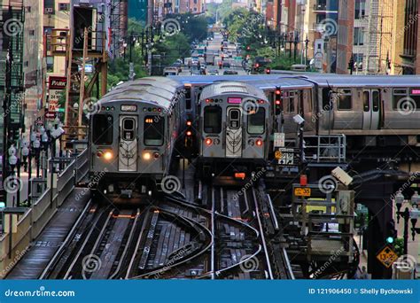 Chicago Elevated El Train Moving Along Tracks At The Corner Of Wells