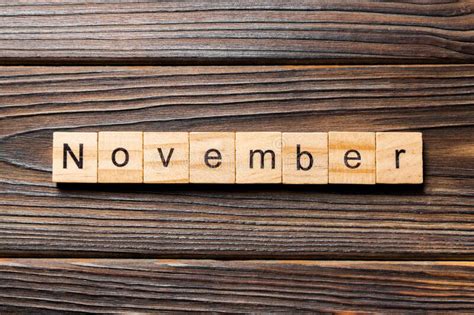 November Word Written On Wood Block November Text On Wooden Table For