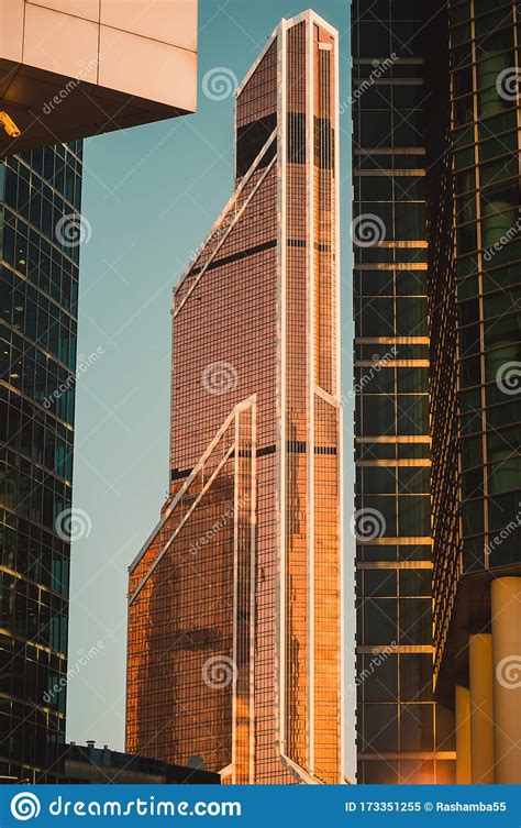 Highrise Building Against Clear Morning Sky Background