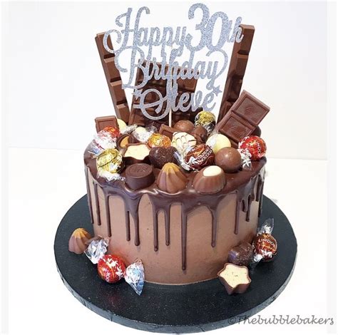 Lindt lindor milk truffles 200g. Chocolate cake loaded with a selection of Lindt chocolate ...