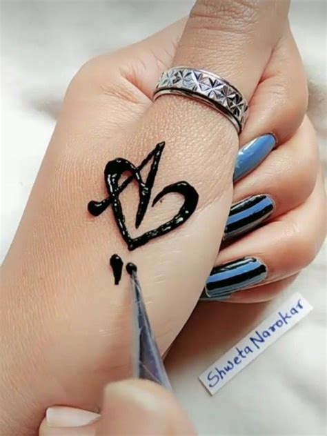 Girls can prefer this mehndi design on wedding occasions and big parties as it is a fancy design. love Alphabets.. image by Simran Qureshi | Mehndi designs ...
