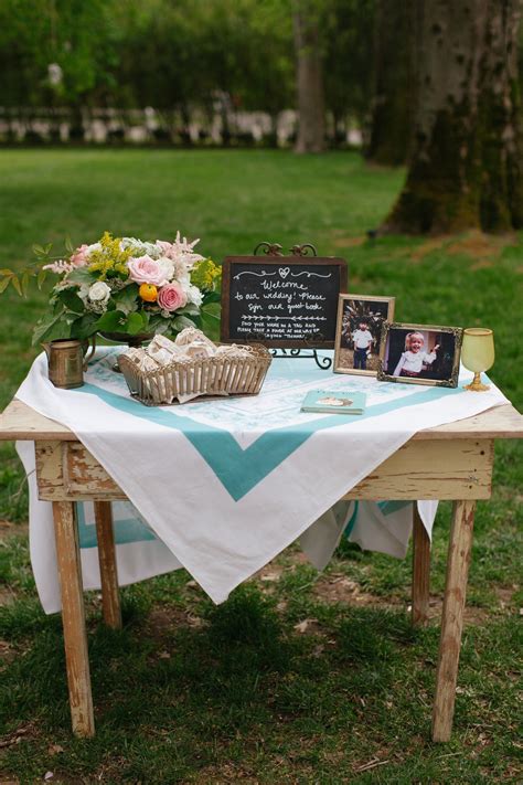 Your guests can write up their good wishes on small slips of paper, and all the point is that every guest writes their message on a slip of decor and hangs it on the tree. Vintage Guest Book Table (With images) | Guest book table ...