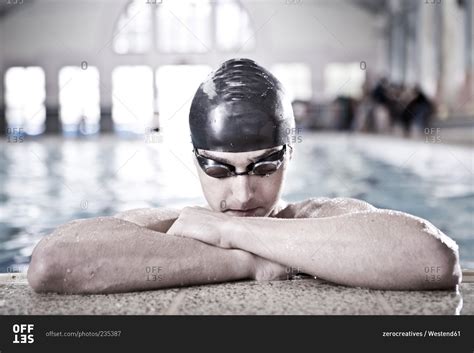 Swimmer In Indoor Pool At Pool Edge Stock Photo Offset