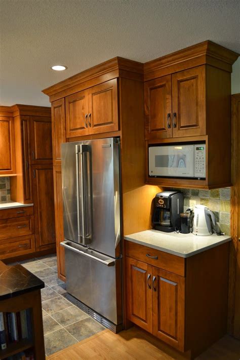 Navy cabinets and expanded space breathe new life into a 1940s kitchen. kraftmaid countertop microwave shelf - Google Search ...