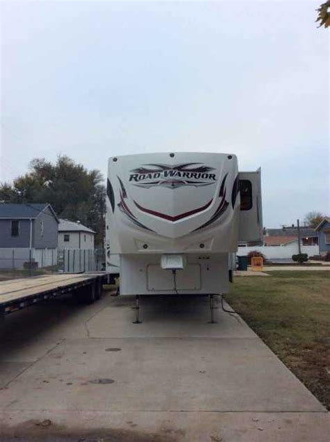 Heartland road warrior toy hauler 411 highlights: 2011 Used Heartland Road Warrior 405RW Toy Hauler in ...