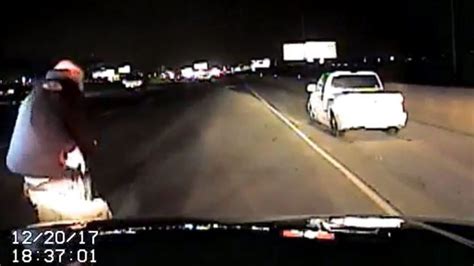 watch dashcam footage shows utah cops shoot moving truck with full auto hit bystander and a