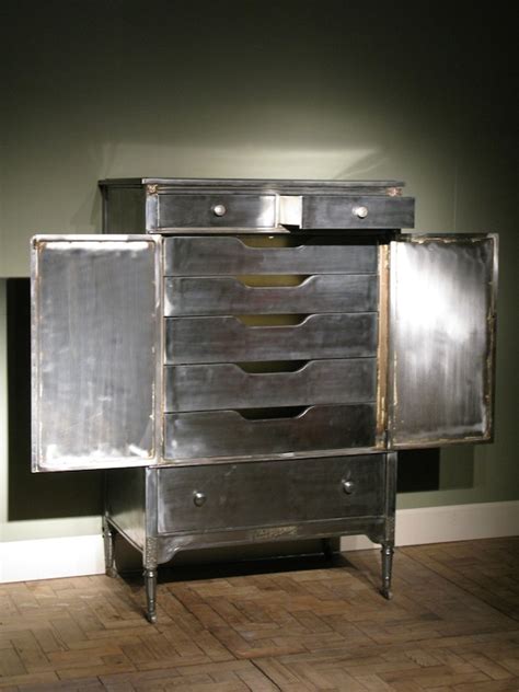 The company ekom produces a wide range of metal cabinets for storage of personal luggage, clothes, documents, money and other values in factories, offices, stores, banks, sports centers. Wonderful 1920s American Metal Cabinet by Simmons and ...