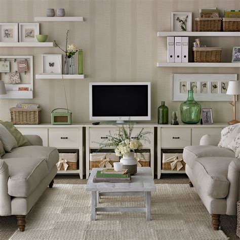 Attach a solid wood bookcase onto a rotating platform and hang the tv screen from the back. 10 ways to disguise your TV | Ideal Home