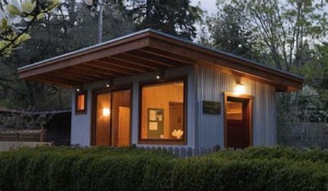Wood shingles or vertical board siding typically covers the exterior, and front doorways. I love little cabins with a single shed roof. No ridge ...