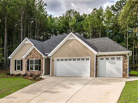 Find single story craftsman ranchers, open concept farmhouse ramblers & more! Ranch House Plans | Affordable Ranch Home Plan with 3-Car ...