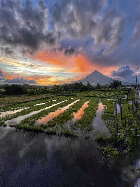 Reflections Of Sunset And Mayon Volcano Photograph By William E Rogers