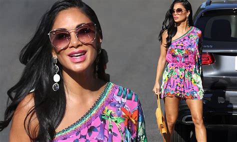 Nicole Scherzinger Puts On Leggy Display In Tiny Floral Romper While Heading To Day Of