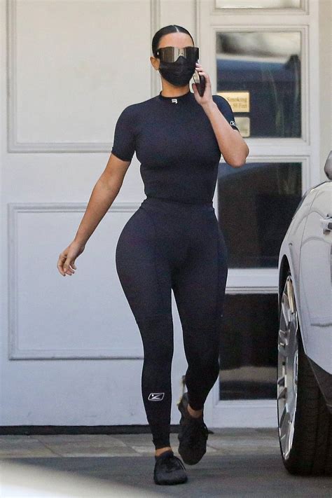 Kim Kardashian Flaunts Her Curves In Form Fitting Black Top And