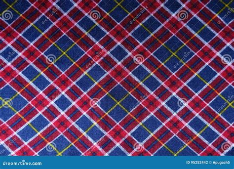 Checked Plaid Fabric In Red Blue And White From Above Stock Photo