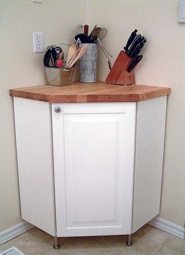 Turn four besta shelf units into a huge corner desk by adding a corner leg support and a long top that ties all the pieces together into one unit. Corner Cabinet + Countertop Hack - IKEA Hackers - IKEA Hackers