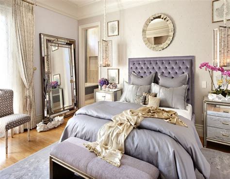 The moody bedroom is deeply relaxing, with deep purple walls, black bedroom furniture and hits of metallics that pick up the light. Silver purple and gold bedroom | Glamourous bedroom ...