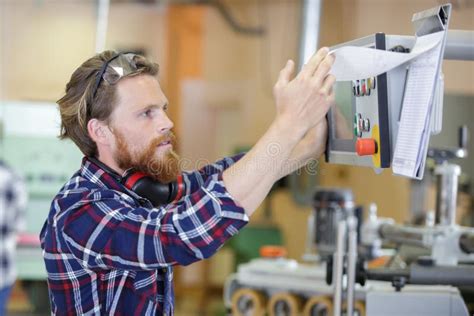 Man Wearing Safety Glasses Works On Machine Stock Image Image Of Electric Engineer 152077227