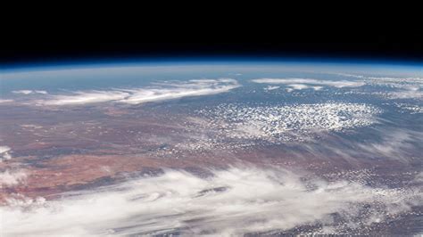 Download Wallpaper 2048x1152 Earth Planet Clouds Space View From