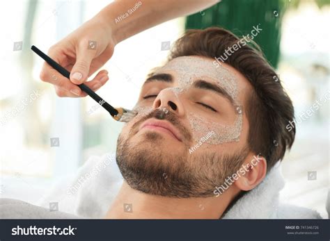 4 Beautician Applying Scrub Onto Young Mans Images Stock Photos