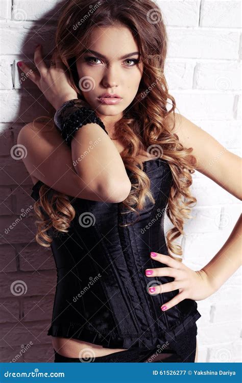 Gorgeous Woman With Long Curly Hair Wears Luxurious Lingerie And Pantyhose Stock Image Image