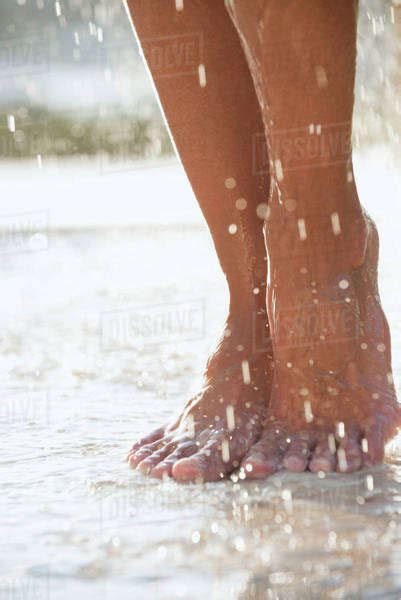 Feet Under Shower Outdoors Stock Photo Dissolve