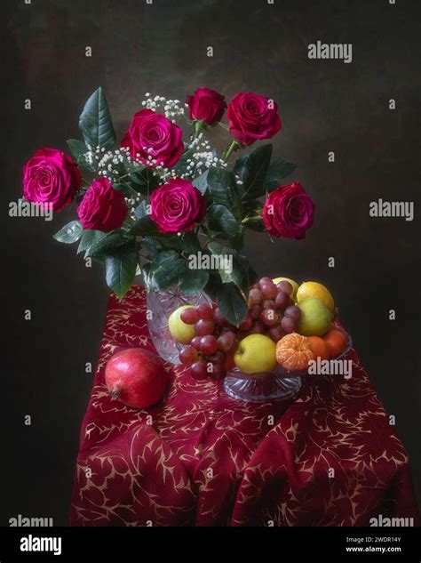Still Life With Roses And Fruits Stock Photo Alamy
