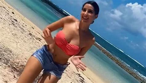 Nora Fatehi Oozes Oomph In A HOT Bandeau Bikini Top With Tiny Denim
