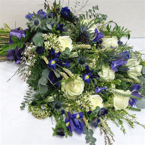 Send fresh flowers online in rich, warm colours. Funeral Flowers Edinburgh | Floral Tributes | Sympathy Flowers