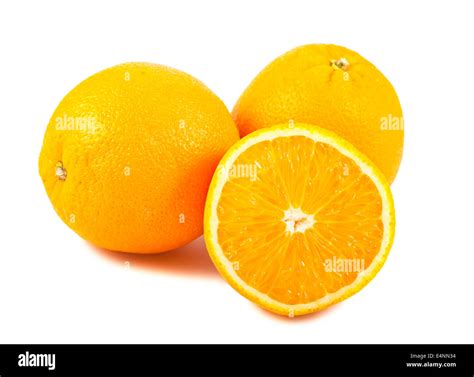 Sliced And Whole Orange Fruits Stock Photo Alamy