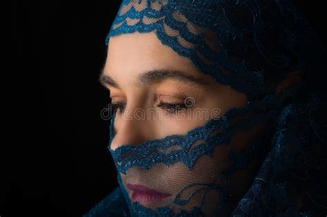 Middle Eastern Woman Portrait Looking Sad With Blue Hijab Artist Stock