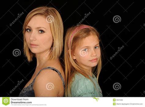 Teenager and young sister stock image. Image of heights - 9041463
