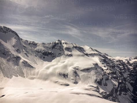 Switzerland Glarus Linthal Snow Covered Mountains Stockphoto