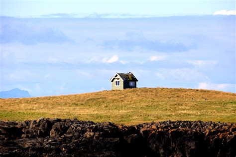 Small House On A Small Island Stock Photo Download Image