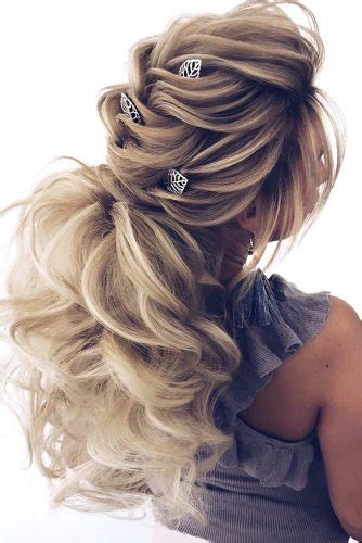 This hairstyle is a look that you can combine with lovely hats that are placed. 65 Stunning Prom Hairstyles for Long Hair for 2019