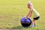 Little Girl Playing With Big Ball Free Stock Photo - Public Domain Pictures