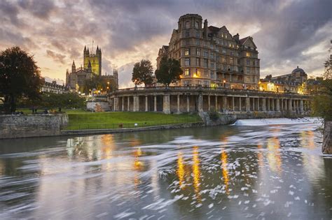 A Dusk View Along The River Avon With Bath Abbey In The Heart Of Bath