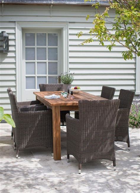 A wooden dining chair and dining table. Pin on Garden