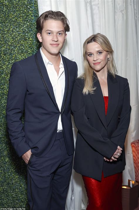 Reese Witherspoon Shines In Red Gown Joined By Son Deacon At Glamorous Vanity Fair Pre Golden