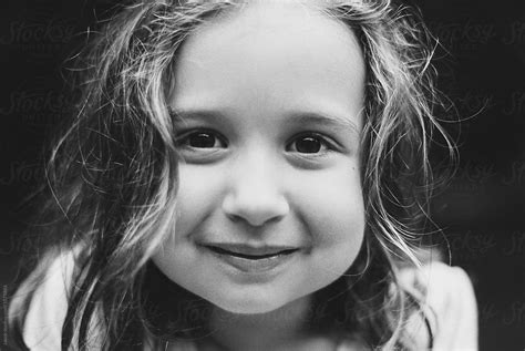 Close Up Portrait Of A Beautiful Young Girl In Black And White By