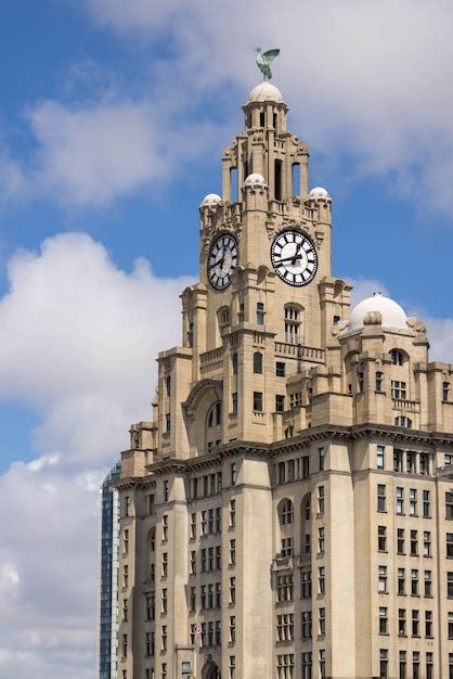 Premium Photo The Royal Liver Building With A Clock Tower In