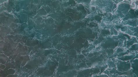 An Aerial Birds Eye Shot Of The Ocean And Waves Youtube